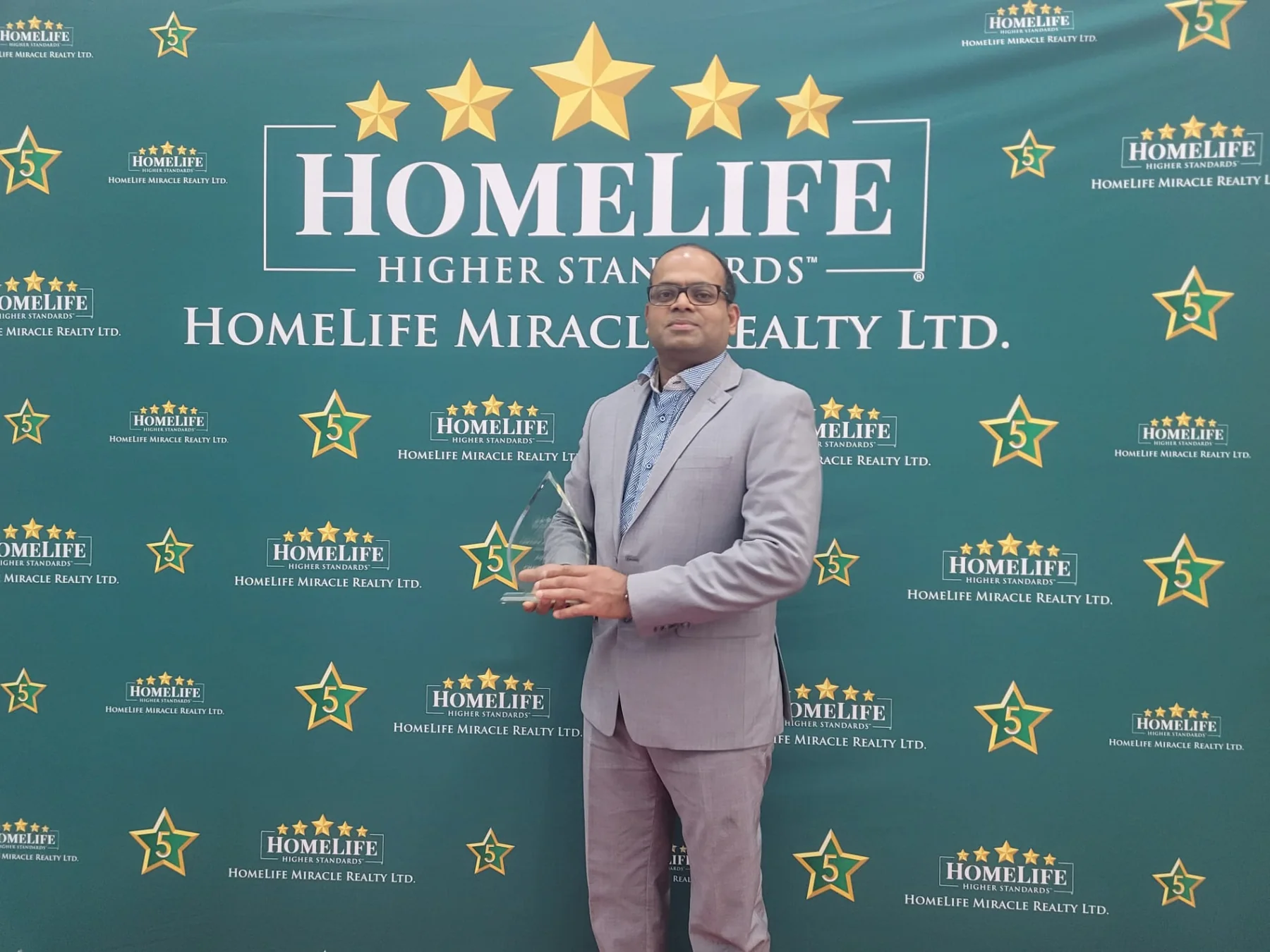 Sharif Khan professional achievement and recognition moment 13