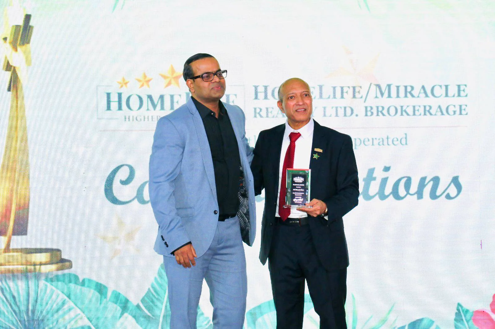 Sharif Khan professional achievement and recognition moment 14