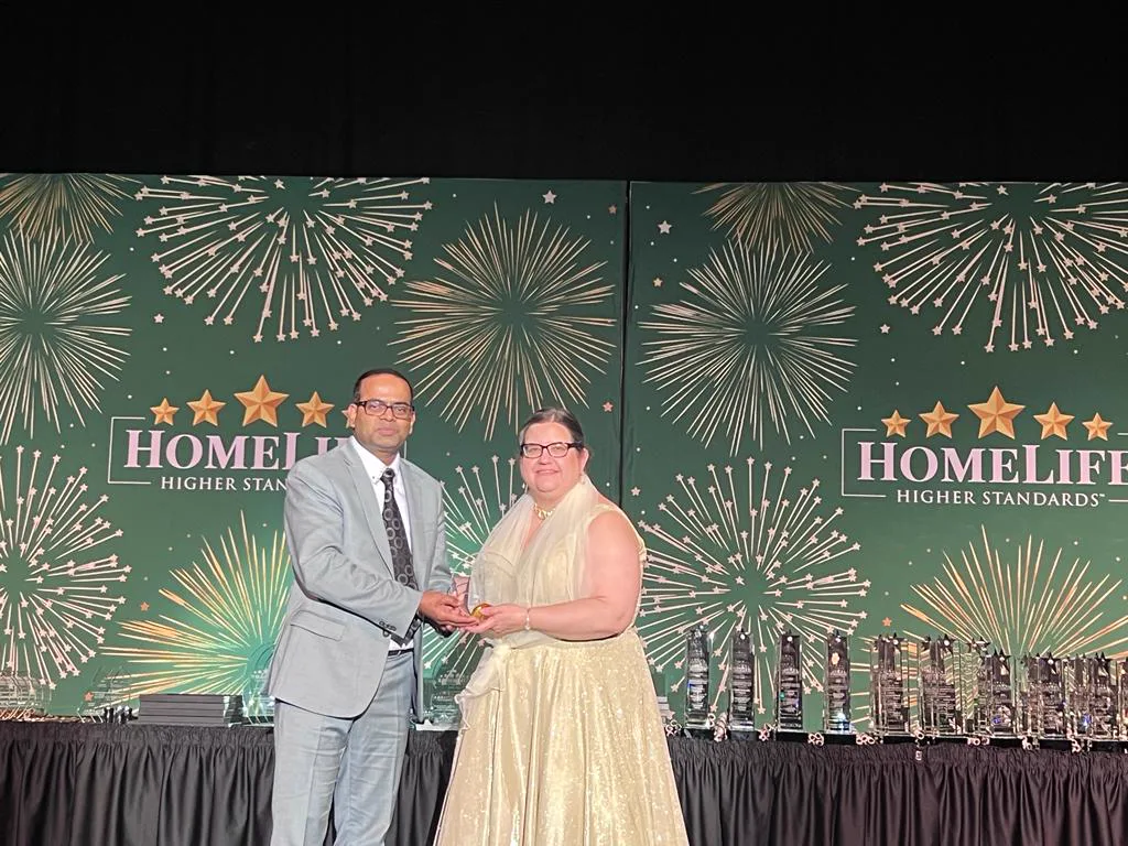 Sharif Khan professional achievement and recognition moment 12