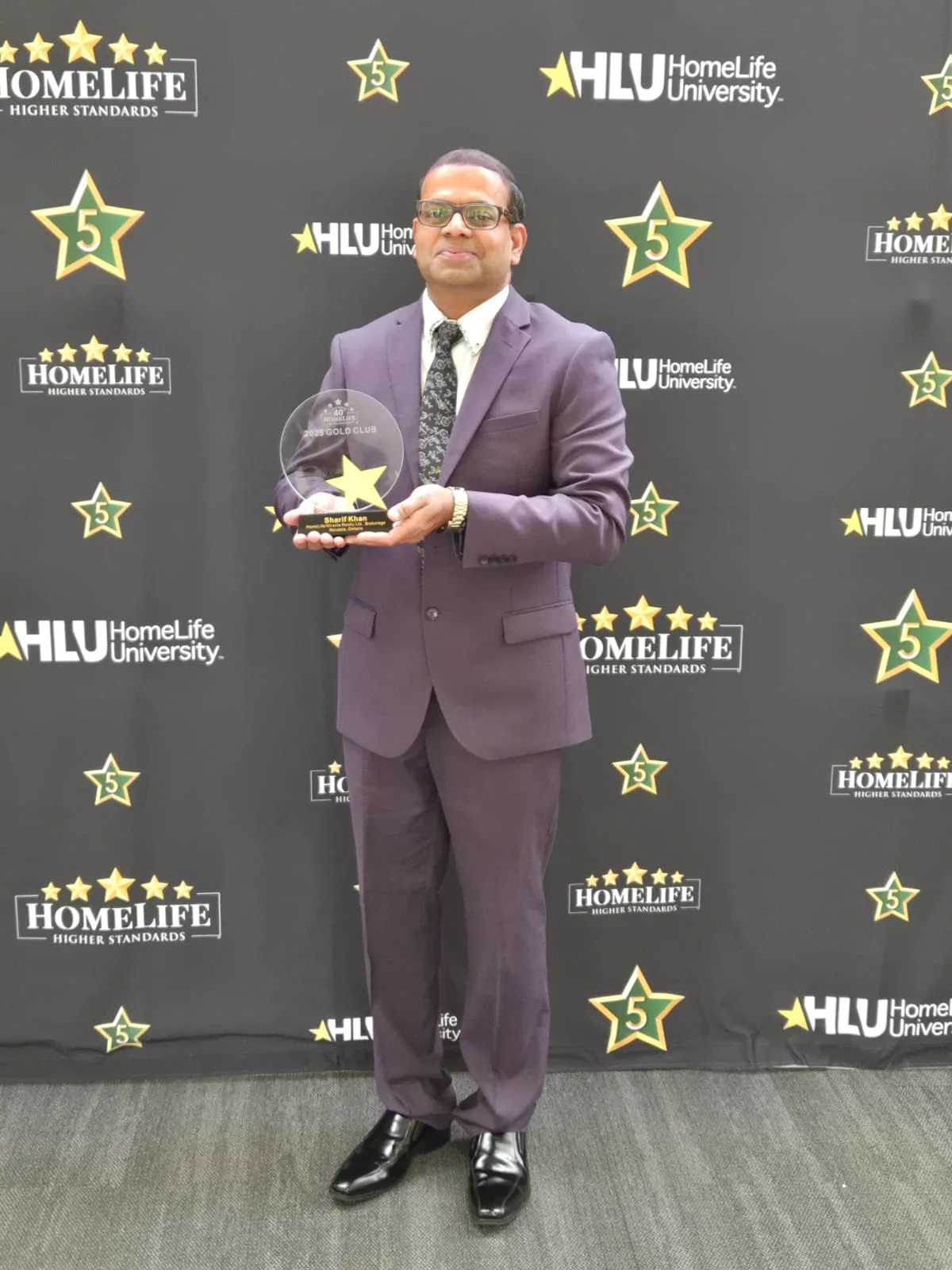 Sharif Khan professional achievement and recognition moment 6