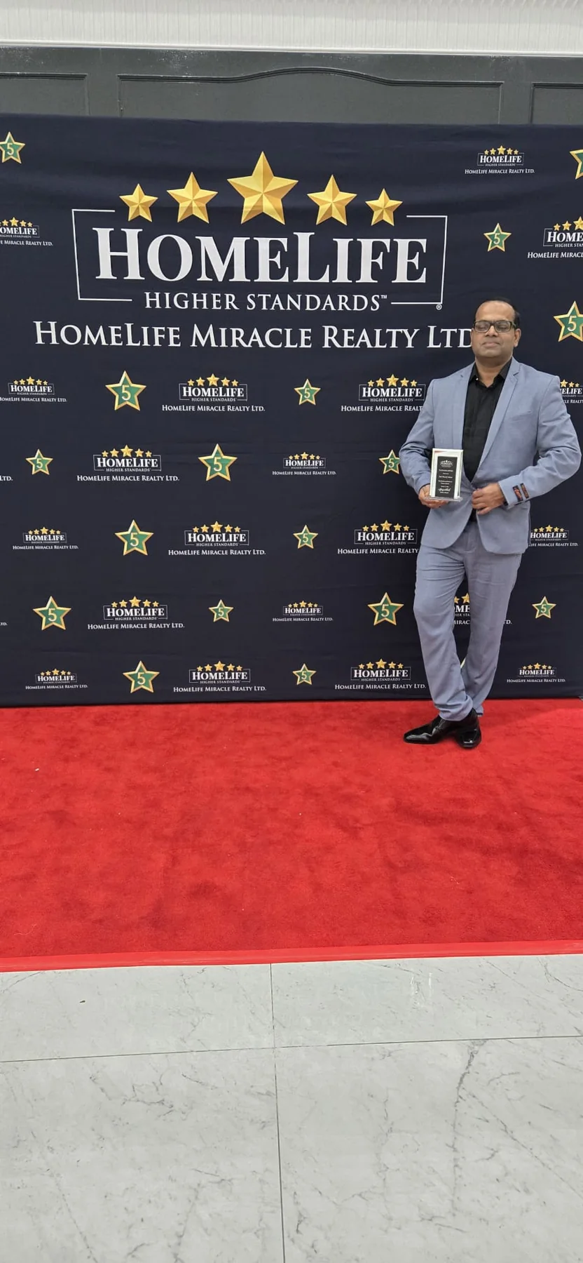 Sharif Khan professional achievement and recognition moment 17