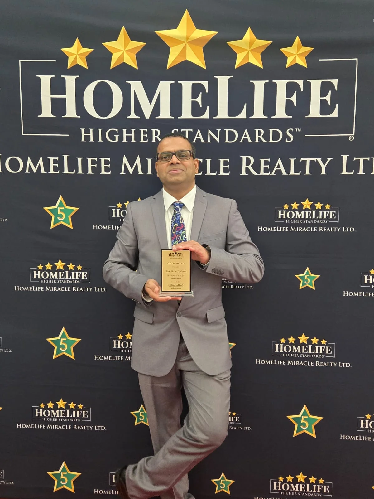 Sharif Khan professional achievement and recognition moment 15