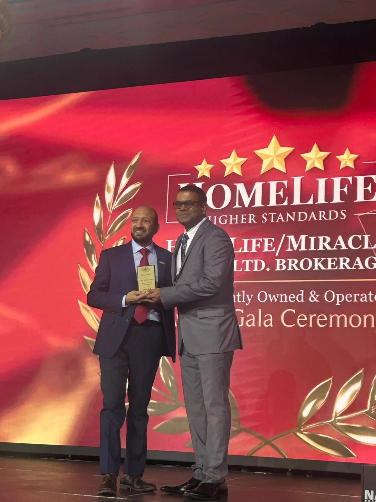 Sharif Khan professional achievement and recognition moment 8