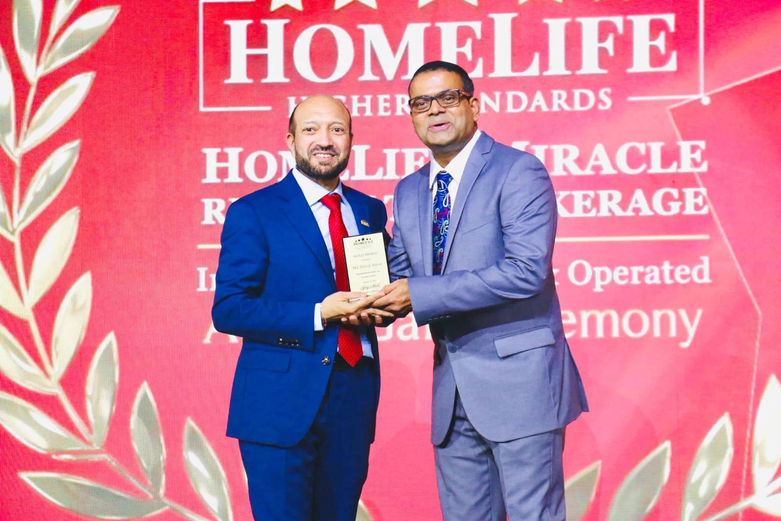 Sharif Khan professional achievement and recognition moment 20